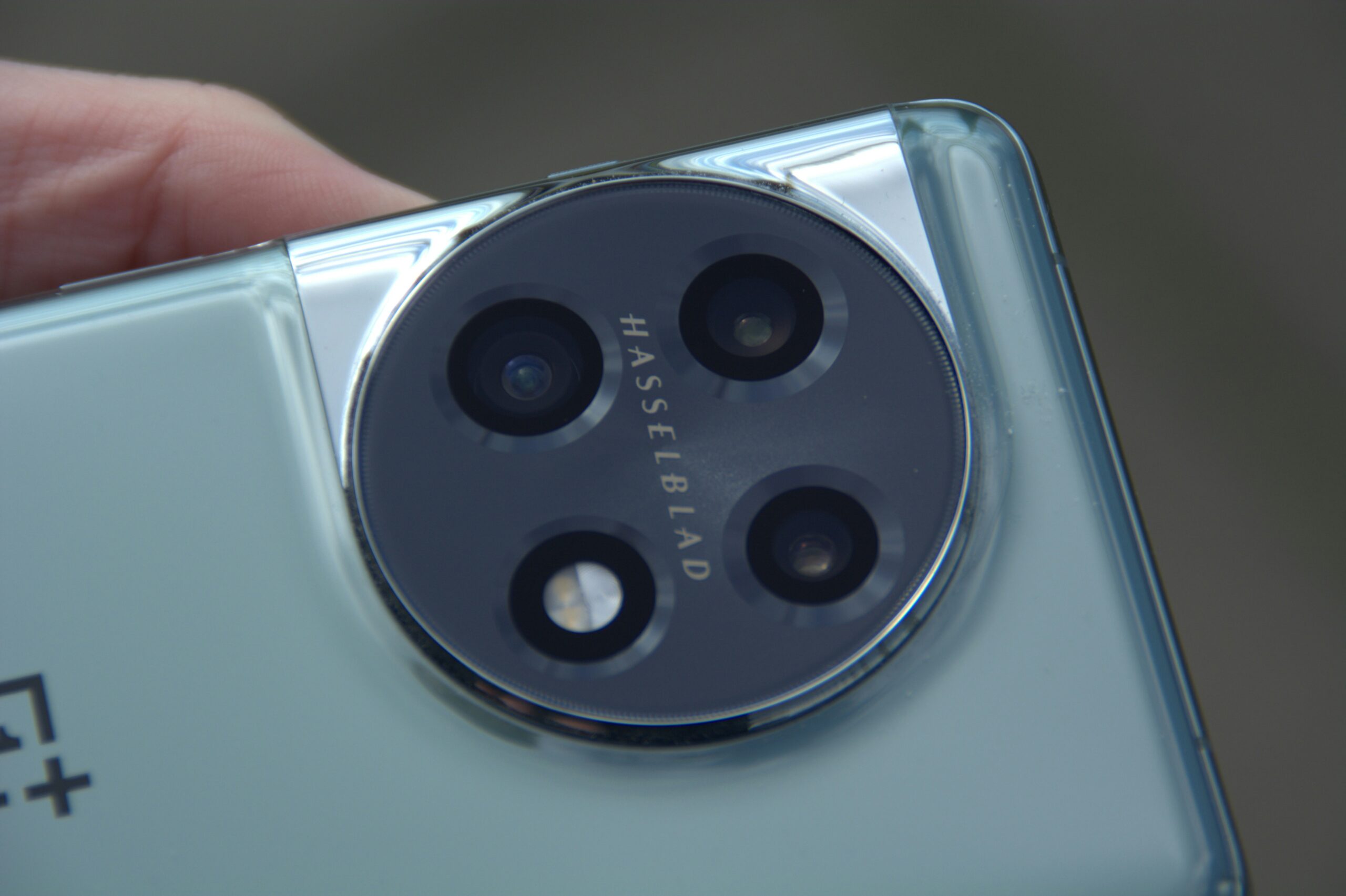 Close up of multiple smartphone camera lenses - A closeup shot of a Oneplus 11 5G Hasselblad camera module