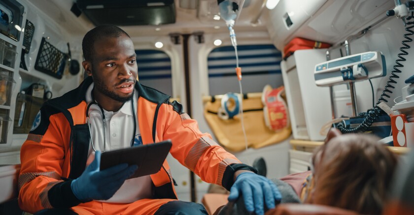 Paramedic using tablet technology - Loud and Clear: Pennsylvania EMS Pilots Translation Tech