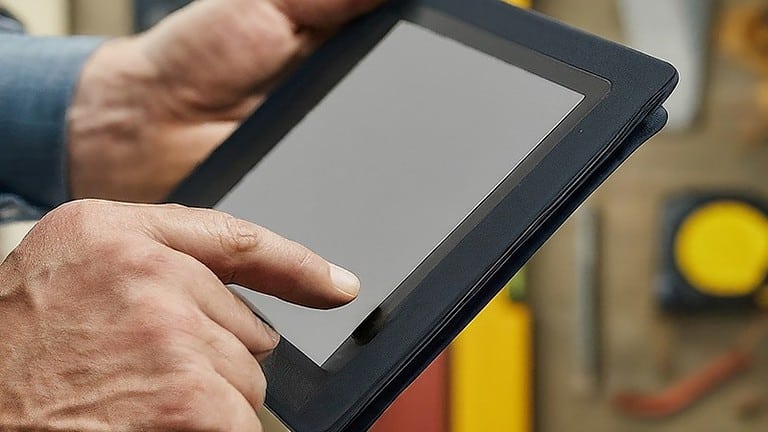 person comparing different budget Android phones - Easy, Smart Ways to Create a Construction Budget