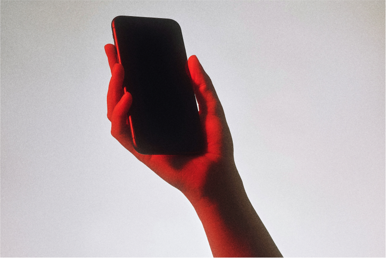 Person making 911 video call on smartphone - Text Calls with IP Relay